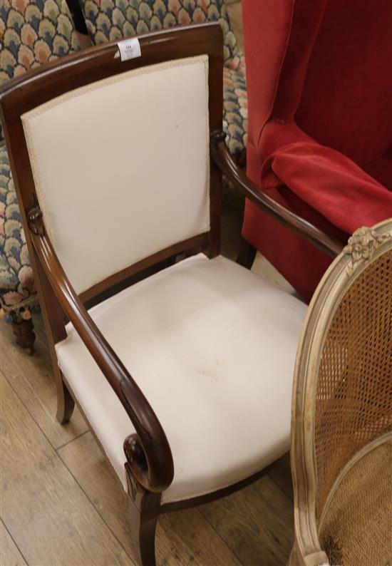 A French Empire mahogany scroll arm fauteuil